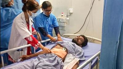 An injured undergoes treatment at a hospital in Begusarai district. (PTI) An injured undergoes treatment at a hospital in Begusarai district. (PTI)