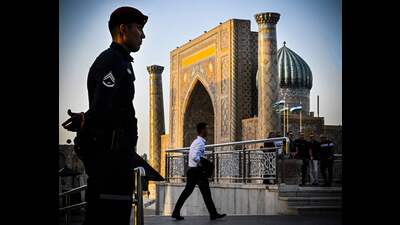 People stand in front of the Registan square in downtown Samarkand on September 13, 2022 (AFP) People stand in front of the Registan square in downtown Samarkand on September 13, 2022 (AFP)