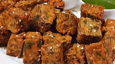 Kothimbir Vada: This is a traditional snack made using cilantro (kothimbir) and gram flour. It is served with some spicy chilly and mint chutney. (Instagram/@poojas_foodlife) Kothimbir Vada: This is a traditional snack made using cilantro (kothimbir) and gram flour. It is served with some spicy chilly and mint chutney. (Instagram/@poojas_foodlife)