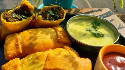 Pudachi Vadi: Also known as Sambarvadi, Pudachi Vadi is a popular snack in the Vidarbha region of Maharashtra. There are two versions of this - sweet and spicy. The outside is made with gram flour while the stuffing is prepared with dried grated coconut, coriander, chilli powder, and Indian spices. (Instagram/@noviceshilpa) Pudachi Vadi: Also known as Sambarvadi, Pudachi Vadi is a popular snack in the Vidarbha region of Maharashtra. There are two versions of this - sweet and spicy. The outside is made with gram flour while the stuffing is prepared with dried grated coconut, coriander, chilli powder, and Indian spices. (Instagram/@noviceshilpa)