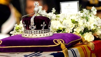 Queen Elizabeth II Funeral: The Koh-i-noor, or "mountain of light," diamond, set in the Maltese Cross at the front of the crown made for Britain's late Queen Mother Elizabeth, is seen on her coffin. (AP) Queen Elizabeth II Funeral: The Koh-i-noor, or "mountain of light," diamond, set in the Maltese Cross at the front of the crown made for Britain's late Queen Mother Elizabeth, is seen on her coffin. (AP)