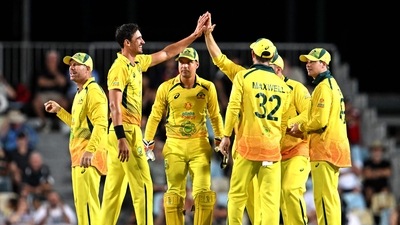 Australian paceman Mitchell Starc (2nd L) celebrates with Australian teammates (AFP)