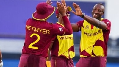 Andre Russell (R) (AP) Andre Russell (R) (AP)