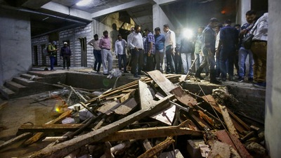 Ahmedabad: Debris lie on the ground after the elevator of an under-construction building crashed, in Ahmedabad, Wednesday. (PTI) Ahmedabad: Debris lie on the ground after the elevator of an under-construction building crashed, in Ahmedabad, Wednesday. (PTI)