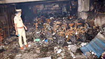 An electric 2-wheeler showroom is located in the cellar of the building, where, according to police, a vehicle caught fire when it was being charged. (Agencies) An electric 2-wheeler showroom is located in the cellar of the building, where, according to police, a vehicle caught fire when it was being charged. (Agencies)