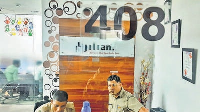Gurugram, India - Sept. 12, 2022: Police personnel sit at the reception of "Jilian Consultants India Pvt Ltd" office at Unit No. 408, 4th Floor, Time Tower, MG road in Gurugram, India, on Monday, September 12, 2022. (Photo by Vipin Kumar/ Hindustan Times) (Story by Leena Dhankhar) (Hindustan Times) Gurugram, India - Sept. 12, 2022: Police personnel sit at the reception of "Jilian Consultants India Pvt Ltd" office at Unit No. 408, 4th Floor, Time Tower, MG road in Gurugram, India, on Monday, September 12, 2022. (Photo by Vipin Kumar/ Hindustan Times) (Story by Leena Dhankhar) (Hindustan Times)