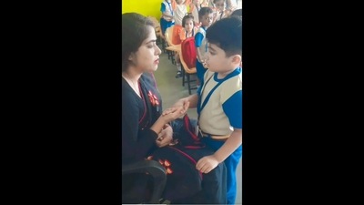The image, taken from the viral video, shows the boy apologising to his teacher in an adorably cute way. (Twitter/@ChapraZila) The image, taken from the viral video, shows the boy apologising to his teacher in an adorably cute way. (Twitter/@ChapraZila)