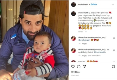 In the photo, Mohsin held Aira close to him as she sat on his lap.