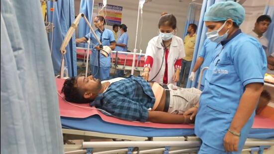 An injured person undergoes treatment at a hospital in Bihar’s Begusarai district. (PTI)