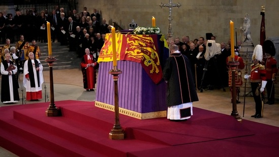 A general view as the coffin carrying Queen Elizabeth II rests in Westminster Hall as the First Guard begins their duty for the Lying-in State in London,(via REUTERS)