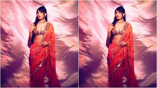Nora played muse to fashion designer Manish Malhotra and picked the stunning six yards of grace for the pictures.(Instagram/@norafatehi)