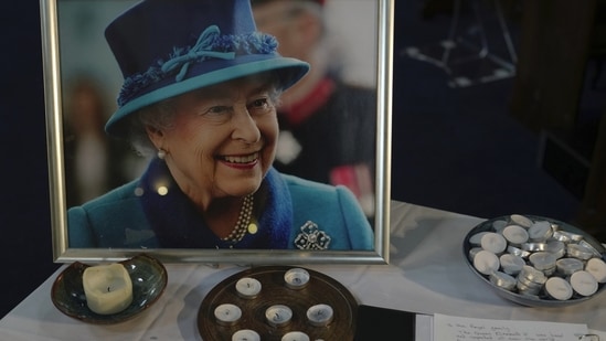 Queen Elizabeth II Funeral: A book of condolence and photo of Queen Elizabeth II are displayed at a church in the district of Southall in London.(AP)