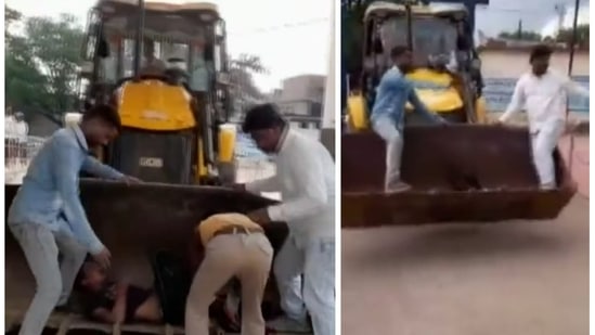 Bike accident victim being taken to hospital in JCB earthmover.(ANI) Bike accident victim being taken to hospital in JCB earthmover.(ANI)