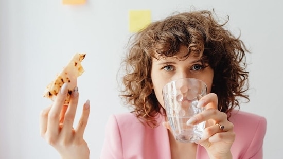 can-you-drink-water-with-your-meal-a-nutritionist-answers-health