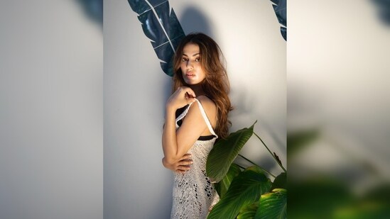 Rhea Chakraborty was clicked in minimal lighting with an aesthetic backdrop for the perfect shot.  (Instagram/@rheachakraborty)