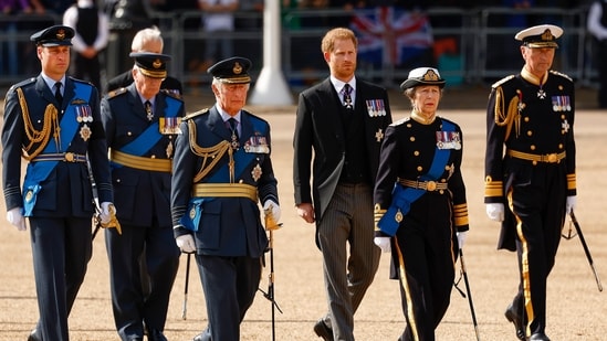 From left, Prince William, King Charles III, Prince Harry, Princess Anne and Timothy Laurence follow the coffin of Queen Elizabeth II from Buckingham Palace to Westminster Hall, London, Wednesday September. 14, 2022. (Jeff J Mitchell/Pool via AP)