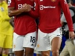 Manchester United's Casemiro, left, and Cristiano Ronaldo leave the pitch after the match(AP) Manchester United's Casemiro, left, and Cristiano Ronaldo leave the pitch after the match(AP)