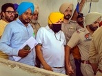 File pic of Daler Mehndi being taken to jail after sentencing for his involvement in a human trafficking case, at District Court complex in Patiala, Thursday, July 14, 2022. (PTI Photo)(PTI) File pic of Daler Mehndi being taken to jail after sentencing for his involvement in a human trafficking case, at District Court complex in Patiala, Thursday, July 14, 2022. (PTI Photo)(PTI)