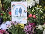 A drawing of Britain's Queen Elizabeth II and Britain's Prince Philip, Duke of Edinburgh, is seen amongst flowers at a floral tribute outside Windsor Castle following the death of Queen Elizabeth II.(AFP) A drawing of Britain's Queen Elizabeth II and Britain's Prince Philip, Duke of Edinburgh, is seen amongst flowers at a floral tribute outside Windsor Castle following the death of Queen Elizabeth II.(AFP)