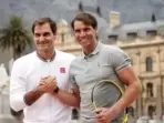 Roger Federer (L) with Rafael Nadal(Reuters) Roger Federer (L) with Rafael Nadal(Reuters)