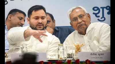 Bihar chief minister Nitish Kumar and Deputy CM Tejashwi Prasad Yadav at a function on rural solar lights scheme in Patna. (PTI) Bihar chief minister Nitish Kumar and Deputy CM Tejashwi Prasad Yadav at a function on rural solar lights scheme in Patna. (PTI)