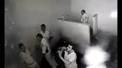 CCTV grab of police personnel who were locked up by Nawada SP on grounds of lack of performance. (ANI) CCTV grab of police personnel who were locked up by Nawada SP on grounds of lack of performance. (ANI)