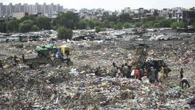 Garbage being dumped in the open at the Shakti Khand landfill site in Ghaziabad city. (Sakib Ali/ HT) Garbage being dumped in the open at the Shakti Khand landfill site in Ghaziabad city. (Sakib Ali/ HT)