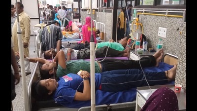 All beds in the hospital’s emergency wing are occupied with patients complaining of high-grade fever. (Sant Arora/HT)