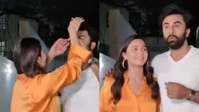 Alia Bhatt tried to fix Ranbir Kapoor's hair. Alia Bhatt tried to fix Ranbir Kapoor's hair.