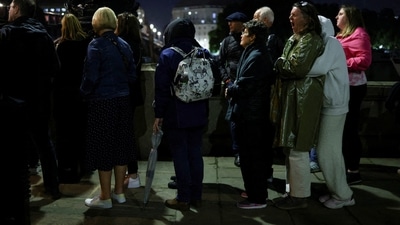 People gather to pay respects to Britain's Queen Elizabeth following her death, in London, Britain on September 14. (REUTERS)