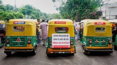 Delhi BJP MLAs ‘gift’ 5 autorickshaws to Kejriwal after tiff with Gujarat cop (PTI) Delhi BJP MLAs ‘gift’ 5 autorickshaws to Kejriwal after tiff with Gujarat cop (PTI)