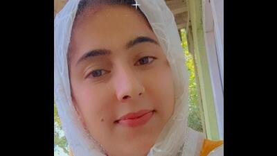 Sabreena Khaliq, in her 20s and mother of three children – two of whom are school-going, has topped this year’s Class-10 bi-annual board examination in Kashmir with 93 percent marks creating excitement among Valley’s homemaker women. (HT Photo) Sabreena Khaliq, in her 20s and mother of three children – two of whom are school-going, has topped this year’s Class-10 bi-annual board examination in Kashmir with 93 percent marks creating excitement among Valley’s homemaker women. (HT Photo)
