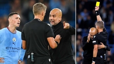 Pep Guardiola hugs referee after being booked at UEFA Champions League (Twitter/cityfcfans) Pep Guardiola hugs referee after being booked at UEFA Champions League (Twitter/cityfcfans)
