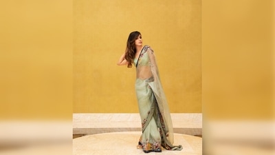 Rhea Chakraborty paired her contemporary saree with a cut-out sleeveless backless matching blouse. (Instagram/@rhea_chakraborty)