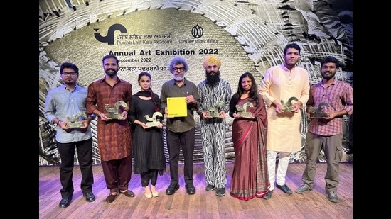 From left: Artists Suyash Choyal, Rahul Dhiman, Jashandeep Kaur, PLKA pesident Diwan Manna, artists Gurjeet Singh, Sakshi Sharma, Piyush Gupta, and Neeraj at Punjab Kala Bhawan, Sector 16, in Chandigarh on Thursday (HT Photos)