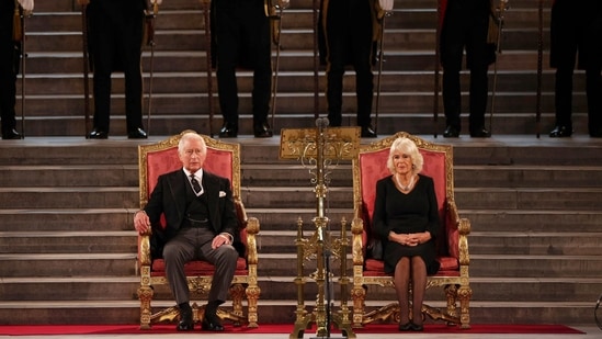 King Charles III and Camilla, the Queen Consort sit, in Westminster Hall.(AP)