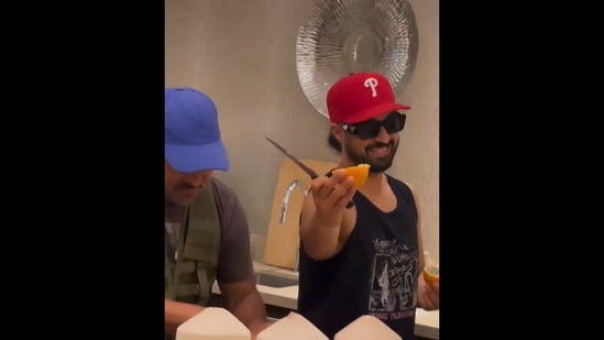 The image, taken from the viral Instagram video by Diljit Dosanjh, shows him working in the kitchen and dancing.(Instagram/@diljitdosanjh)