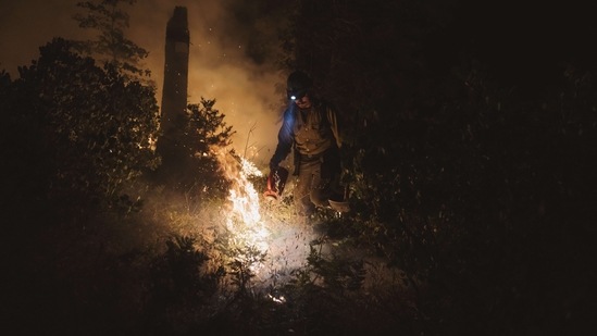 “The fire area remains a dynamic situation that may change at any time, as evidenced by the fire activity on Tuesday afternoon,” Cal Fire said.(AFP)