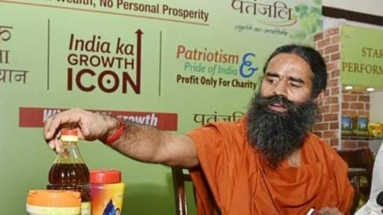 Baba Ramdev promoting Patanjali products in New Delhi. (HT file photo)