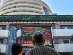 People watch the Sensex on a screen outside Bombay Stock Exchange (BSE) in Mumbai.(PTI file) People watch the Sensex on a screen outside Bombay Stock Exchange (BSE) in Mumbai.(PTI file)