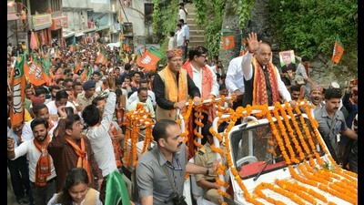 Chief minister Jai Ram Thakur greeting people during road show at Banjar assembly constituency in Kullu district on Friday. (HT Photo) Chief minister Jai Ram Thakur greeting people during road show at Banjar assembly constituency in Kullu district on Friday. (HT Photo)