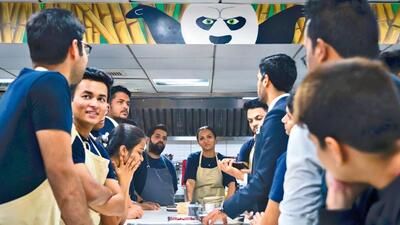 Chef Totlani introduces Sonal Ved to the rest of the team during a pre-serving briefing (Shyamali Patel)