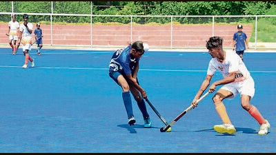 Players during a hockey match under the district-level “Khedan Watan Punjab Diyan” at the PAU ground in Ludhiana on Friday. (Harvinder SIngh/HT)