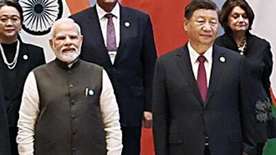 Prime Minister Narendra Modi and Chinese President Xi Jinping poses for a group picture with other world leaders during the SCO Summit in Samarkand on Friday. (ANI/ PIB) Prime Minister Narendra Modi and Chinese President Xi Jinping poses for a group picture with other world leaders during the SCO Summit in Samarkand on Friday. (ANI/ PIB)