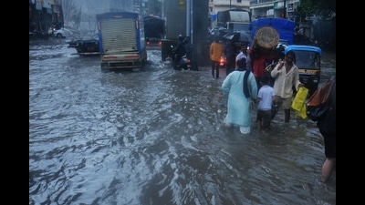 Water logging in Bhiwandi, Thane, on Friday. A five-year-old girl was feared drowned in a nullah in Bhiwandi. Search operations, which had to be abandoned on Friday due to darkness, will resume on Saturday. (HT FILE PHOTO)