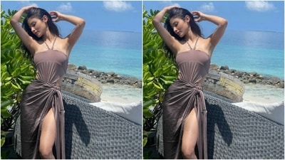 Mouni played muse to fashion designer house Tizzi and picked a grey satin gown for the pictures. (Instagram/@imouniroy)