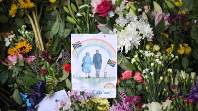  A drawing of Britain's Queen Elizabeth II and Britain's Prince Philip, Duke of Edinburgh, is seen amongst flowers at a floral tribute outside Windsor Castle. (AFP) A drawing of Britain's Queen Elizabeth II and Britain's Prince Philip, Duke of Edinburgh, is seen amongst flowers at a floral tribute outside Windsor Castle. (AFP)