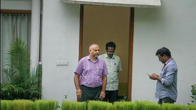ED officials outside the residence of Andhra Pradesh MP Magunta Sreenivasulu Reddy. (PTI) ED officials outside the residence of Andhra Pradesh MP Magunta Sreenivasulu Reddy. (PTI)