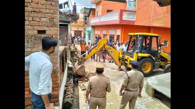 An illegal house being razed in Hamirpur district on Friday. (HT photo) An illegal house being razed in Hamirpur district on Friday. (HT photo)