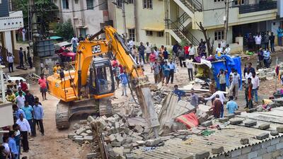 A Bruhat Bengaluru Mahanagara Palike bulldozer demolishes an illegal structure built on stormwater drain in Munnekolala area, in Bengaluru. (PTI File Photo) A Bruhat Bengaluru Mahanagara Palike bulldozer demolishes an illegal structure built on stormwater drain in Munnekolala area, in Bengaluru. (PTI File Photo)